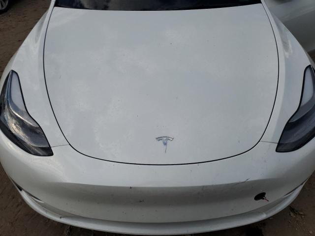 Photo 11 from auction – 2023 TESLA MODEL Y with VIN 7SAYGDEE4PF630290