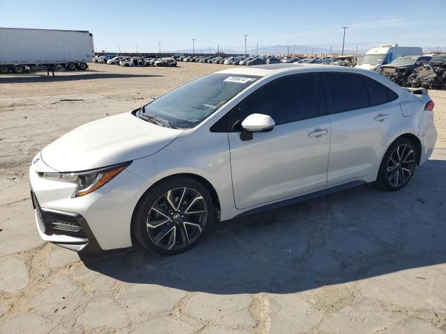 TOYOTA COROLLA SE 2021 with VIN JTDP4MCE8MJ064854 - Photo from auction