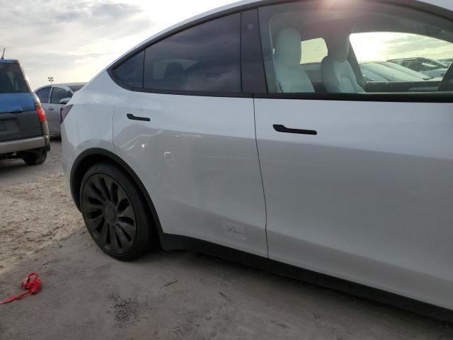 Photo 13 from auction – 2022 TESLA MODEL Y with VIN 7SAYGDEF2NF569141