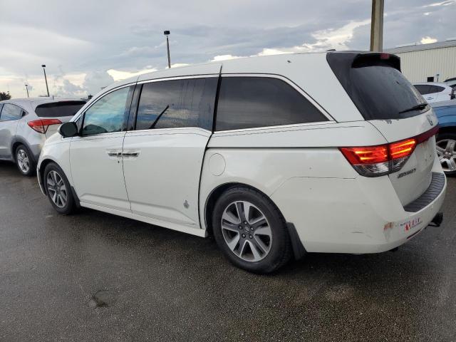 Photo 2 from auction – 2014 HONDA ODYSSEY TO with VIN 5FNRL5H93EB021397