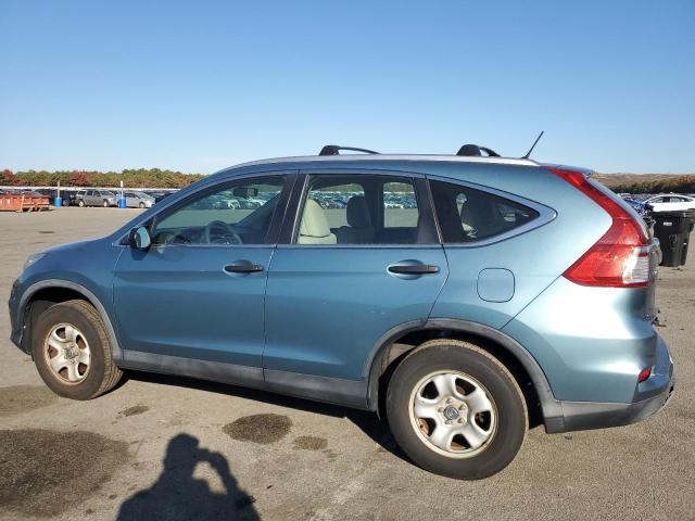 Photo 2 from auction – 2015 HONDA CR-V LX with VIN 5J6RM4H35FL096937