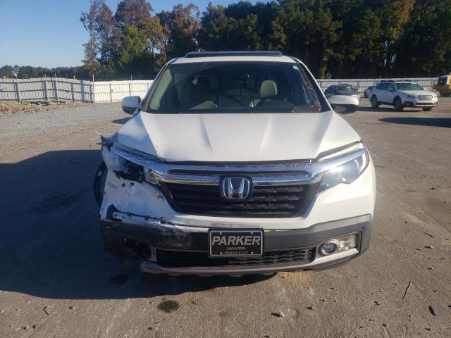 Photo 5 from auction – 2020 HONDA RIDGELINE with VIN 5FPYK3F77LB002473