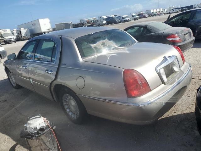 Photo 2 from auction – 2002 LINCOLN TOWN CAR E with VIN 1LNHM81W42Y658364