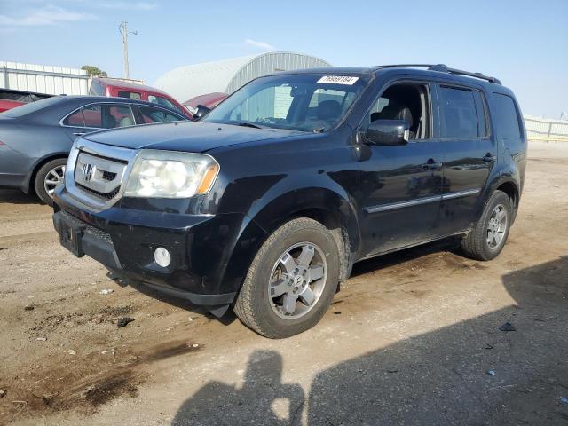 HONDA PILOT TOUR 2011 с VIN 5FNYF4H90BB015985 - Фото с аукциона
