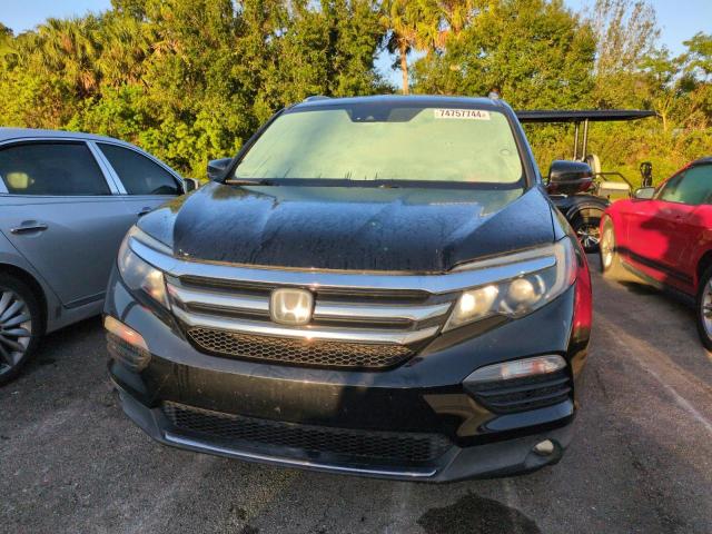 Photo 5 from auction – 2017 HONDA PILOT ELIT with VIN 5FNYF6H07HB067734