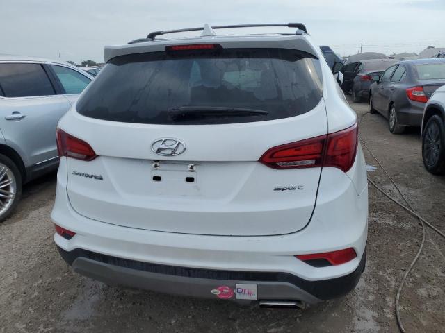 Photo 6 from auction – 2017 HYUNDAI SANTA FE S with VIN 5NMZU3LB5HH001263