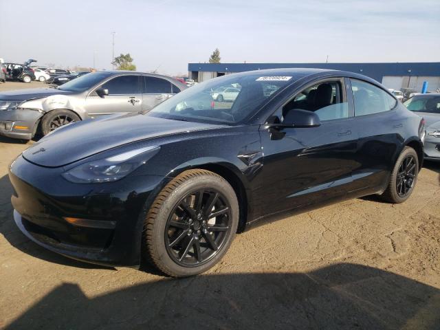 TESLA MODEL 3 2022 with VIN 5YJ3E1EB9NF308985 - Photo from auction