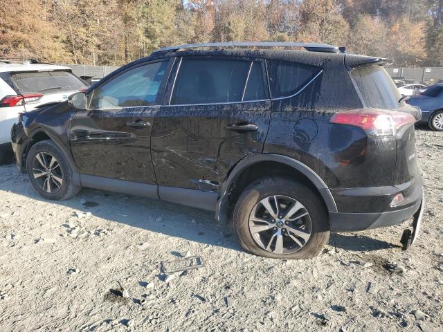 Photo 2 from auction – 2017 TOYOTA RAV4 XLE with VIN 2T3RFREV6HW617361