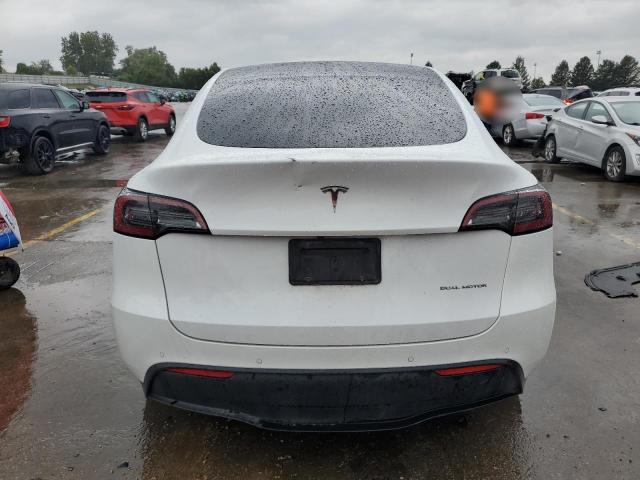 Photo 6 from auction – 2022 TESLA MODEL Y with VIN 7SAYGDEEXNF400511