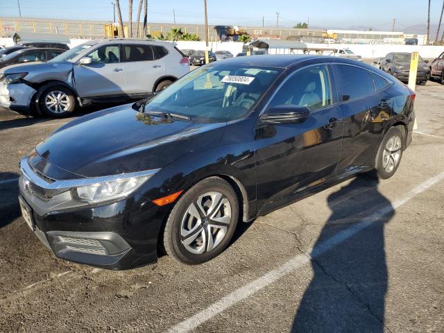 HONDA CIVIC LX 2018 with VIN 2HGFC2F59JH562767 - Photo from auction