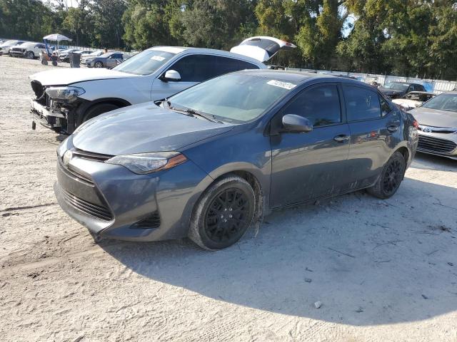 TOYOTA COROLLA L 2017 with VIN 2T1BURHE4HC829396 - Photo from auction