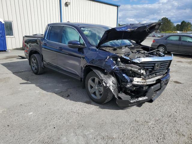 Photo 4 from auction – 2023 HONDA RIDGELINE with VIN 5FPYK3F50PB031236