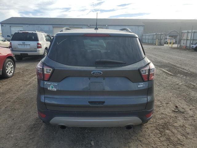Photo 6 from auction – 2017 FORD ESCAPE SE with VIN 1FMCU9GD2HUC16074