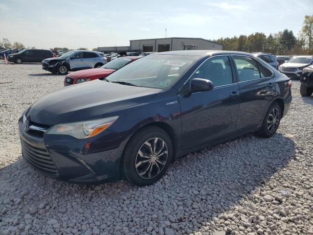 TOYOTA CAMRY HYBR 2016 with VIN 4T1BD1FK0GU199836 - Photo from auction