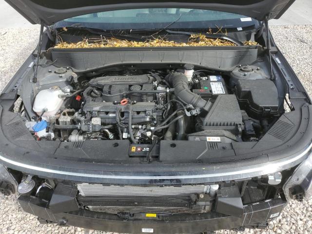 Photo 12 from auction – 2024 HYUNDAI KONA LIMIT with VIN KM8HECA39RU024491