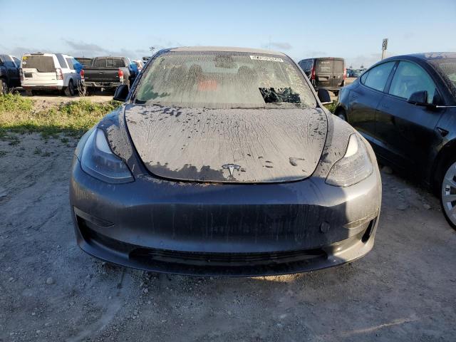 Photo 5 from auction – 2022 TESLA MODEL 3 with VIN 5YJ3E1EAXNF286406
