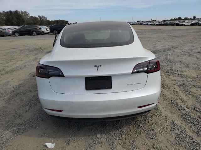 Photo 6 from auction – 2021 TESLA MODEL 3 with VIN 5YJ3E1EB0MF150342