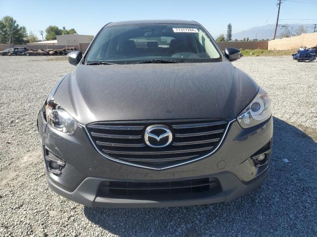 Photo 5 from auction – 2016 MAZDA CX-5 TOURI with VIN JM3KE2CY8G0887632