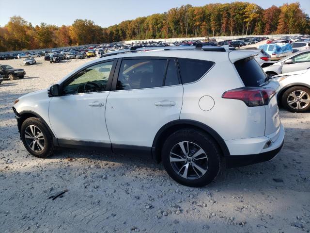 Photo 2 from auction – 2016 TOYOTA RAV4 XLE with VIN JTMRFREV9GD178362