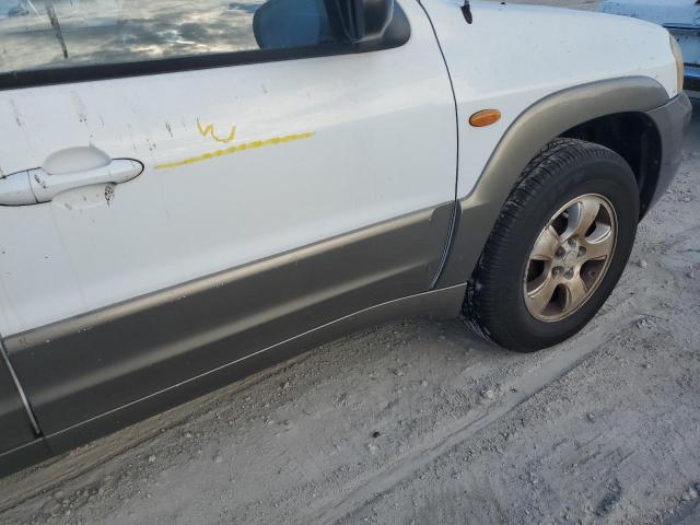 Photo 13 from auction – 2002 MAZDA TRIBUTE LX with VIN 4F2YU09182KM09244