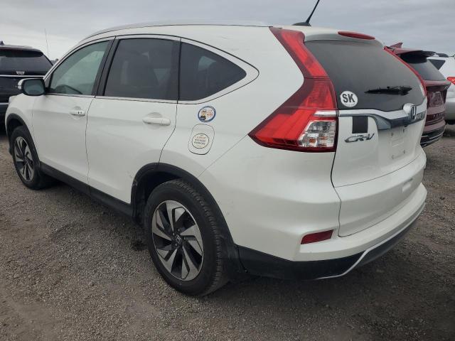 Photo 2 from auction – 2015 HONDA CR-V TOURI with VIN 5J6RM3H97FL012034