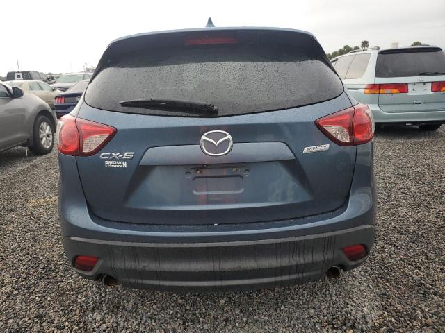 Photo 6 from auction – 2015 MAZDA CX-5 TOURI with VIN JM3KE2CY1F0446844