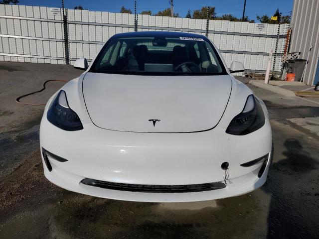 Снимка 5 от търг – 2022 TESLA MODEL 3 с VIN 5YJ3E1EA5NF143265