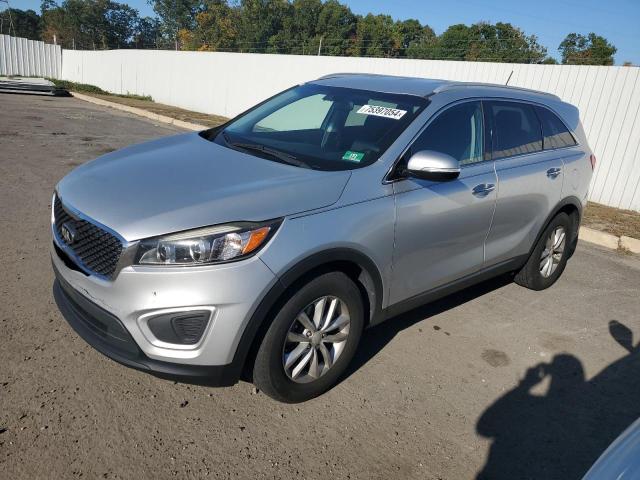 KIA SORENTO LX 2016 with VIN 5XYPG4A31GG103281 - Photo from auction