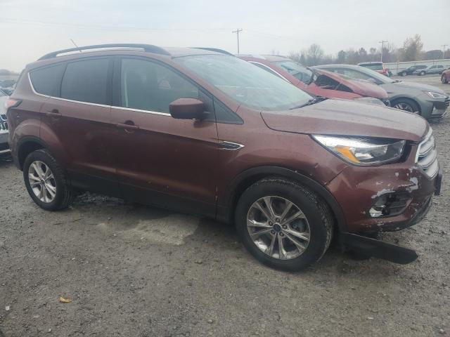 Photo 4 from auction – 2018 FORD ESCAPE SE with VIN 1FMCU9GDXJUA50652