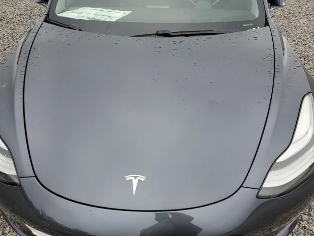 Photo 11 from auction – 2018 TESLA MODEL 3 with VIN 5YJ3E1EA7JF020027