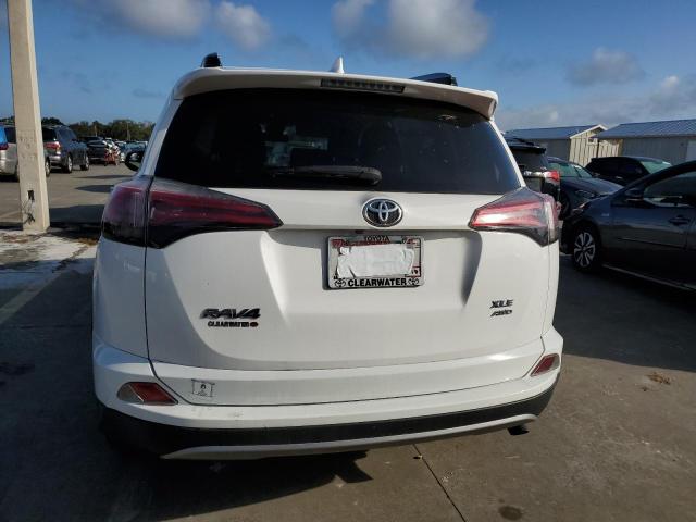 Photo 6 from auction – 2017 TOYOTA RAV4 XLE with VIN JTMRFREV6HD203476