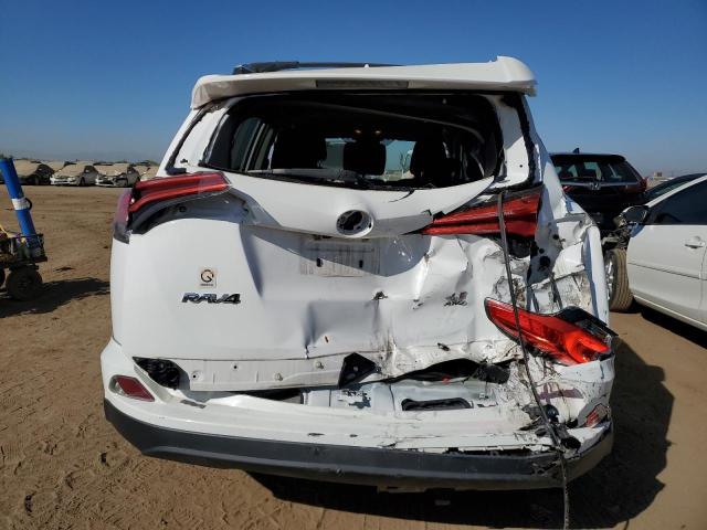 Photo 6 from auction – 2016 TOYOTA RAV4 LE with VIN 2T3BFREV8GW505855