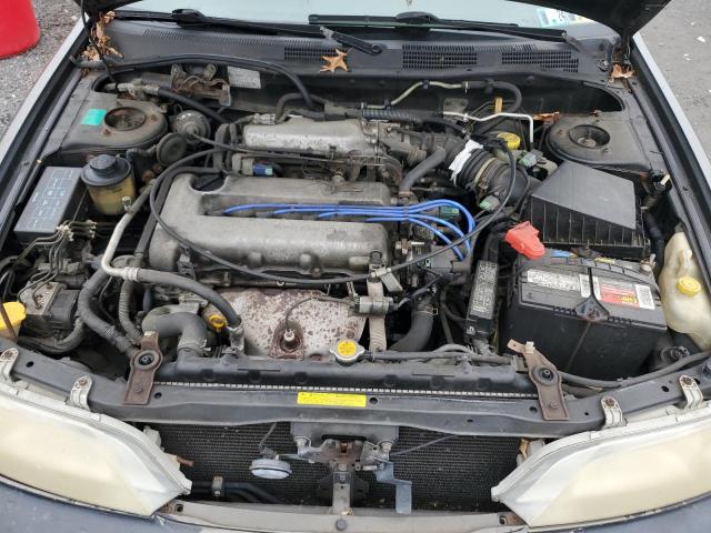 Photo 11 from auction – 2000 INFINITI G20 with VIN JNKCP11A1YT304887