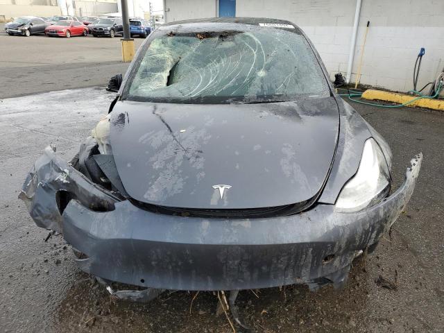 Photo 5 from auction – 2022 TESLA MODEL 3 with VIN 5YJ3E1EB8NF362102