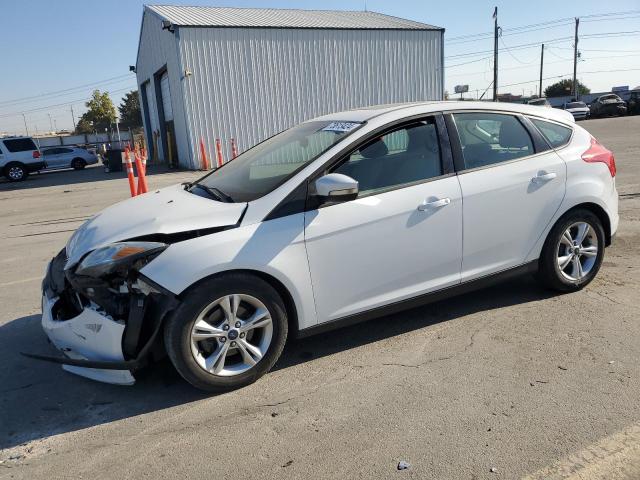 FORD FOCUS SE 2013 with VIN 1FADP3K21DL117321 - Photo from auction