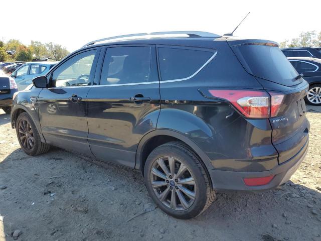 Photo 2 from auction – 2017 FORD ESCAPE TIT with VIN 1FMCU9J90HUE82942