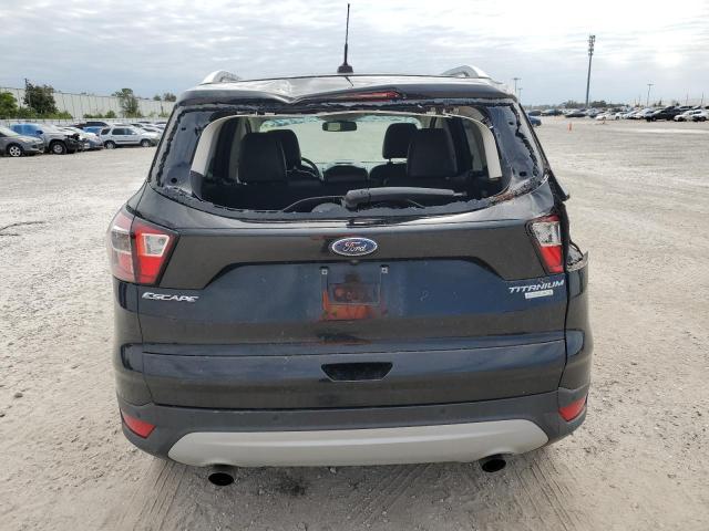 Photo 6 from auction – 2017 FORD ESCAPE TIT with VIN 1FMCU0JD0HUB05933