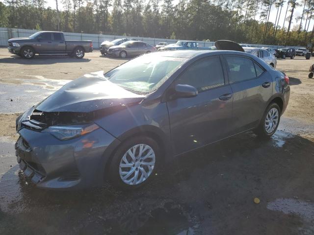 TOYOTA COROLLA L 2017 with VIN 5YFBURHE0HP737718 - Photo from auction