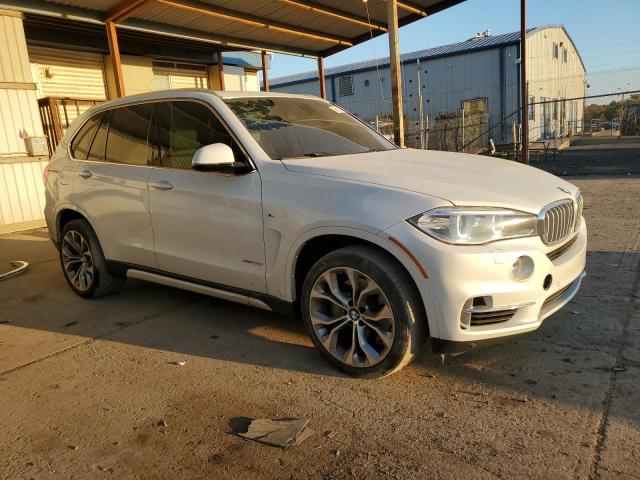 Photo 4 from auction – 2014 BMW X5 XDRIVE5 with VIN 5UXKR6C50E0J72284