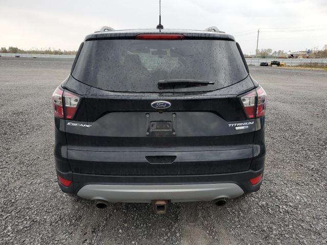 Photo 6 from auction – 2017 FORD ESCAPE TIT with VIN 1FMCU9J9XHUD69273
