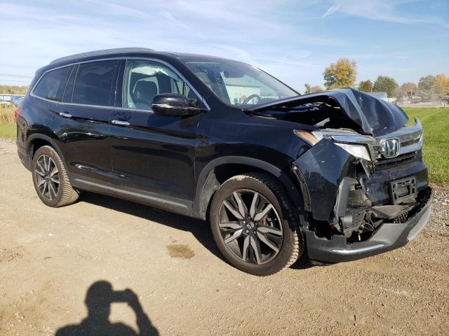 Photo 4 from auction – 2021 HONDA PILOT ELIT with VIN 5FNYF6H08MB007603