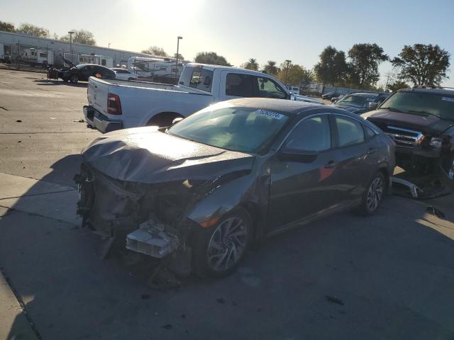 Photo 1 from auction – 2018 HONDA CIVIC EX with VIN 2HGFC2F70JH536804