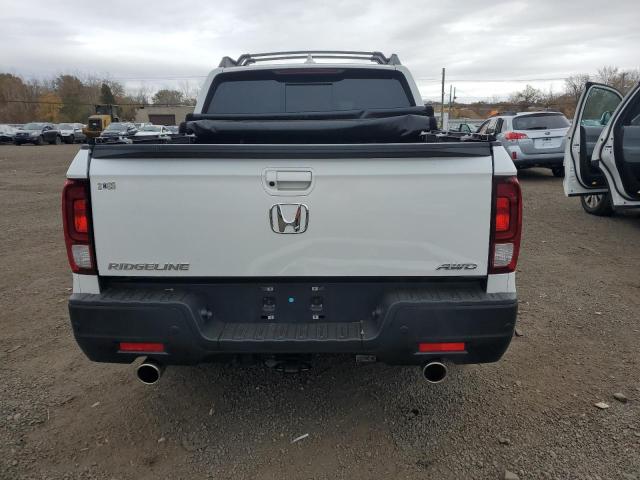 Photo 6 from auction – 2023 HONDA RIDGELINE with VIN 5FPYK3F75PB012599