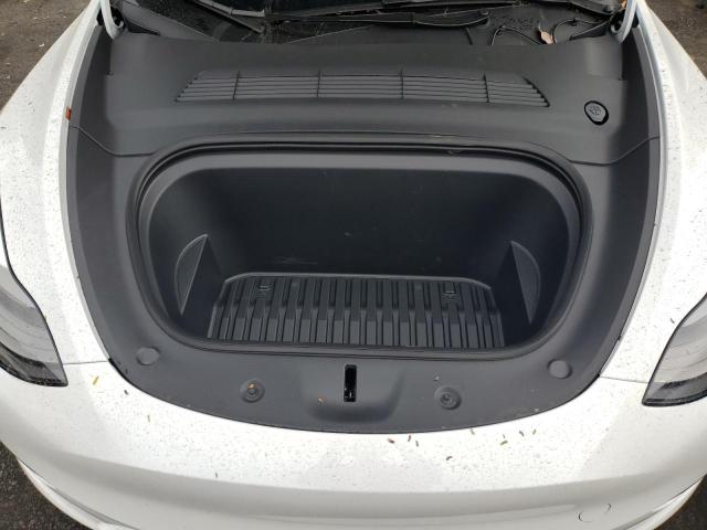 Photo 11 from auction – 2024 TESLA MODEL Y with VIN 7SAYGDEE3RA261440