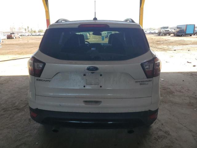 Photo 6 from auction – 2017 FORD ESCAPE TIT with VIN 1FMCU0J99HUC51615