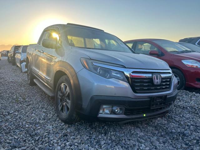 Photo 4 from auction – 2018 HONDA RIDGELINE with VIN 5FPYK3F79JB008238