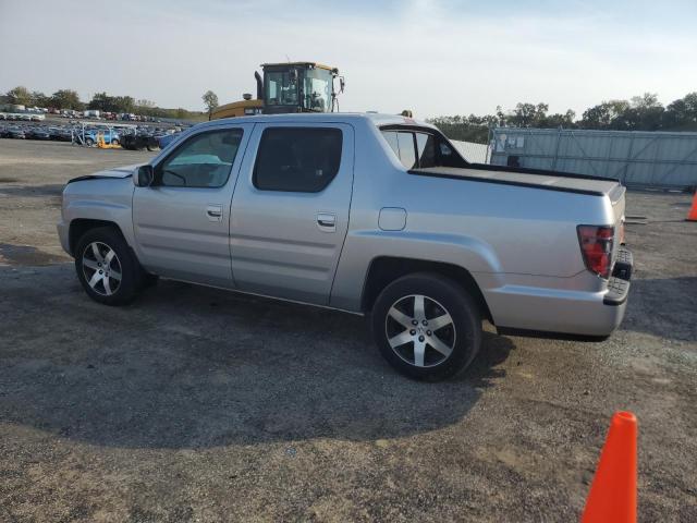 Photo 2 from auction – 2014 HONDA RIDGELINE with VIN 5FPYK1F67EB011723