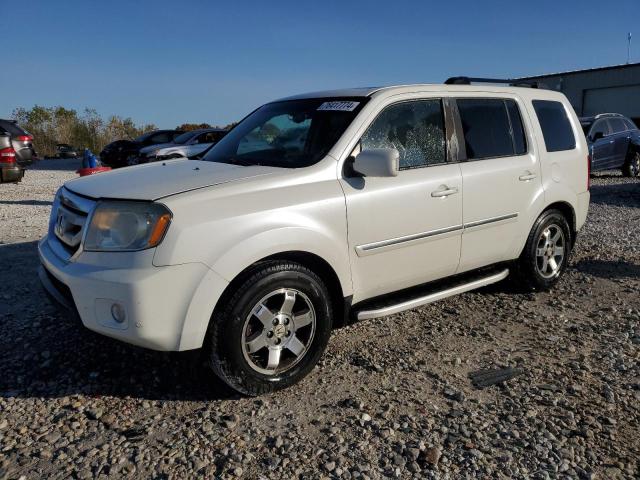 HONDA PILOT TOUR 2011 with VIN 5FNYF4H9XBB036701 - Photo from auction