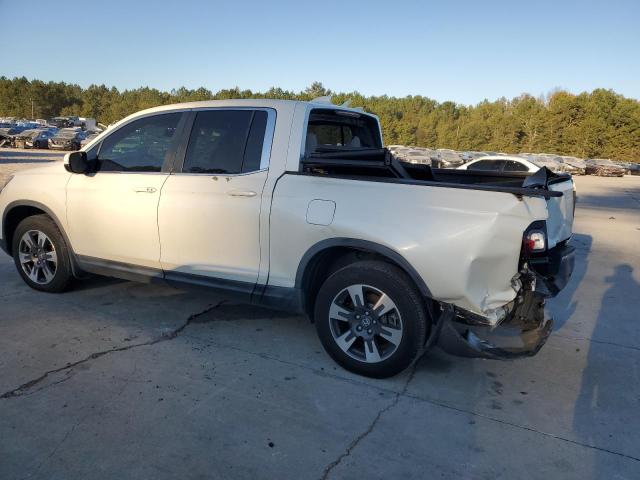 Photo 2 from auction – 2017 HONDA RIDGELINE with VIN 5FPYK2F63HB008764