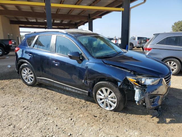 Photo 4 from auction – 2016 MAZDA CX-5 TOURI with VIN JM3KE2CY3G0608541